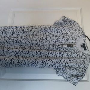 Black polka dot white dress